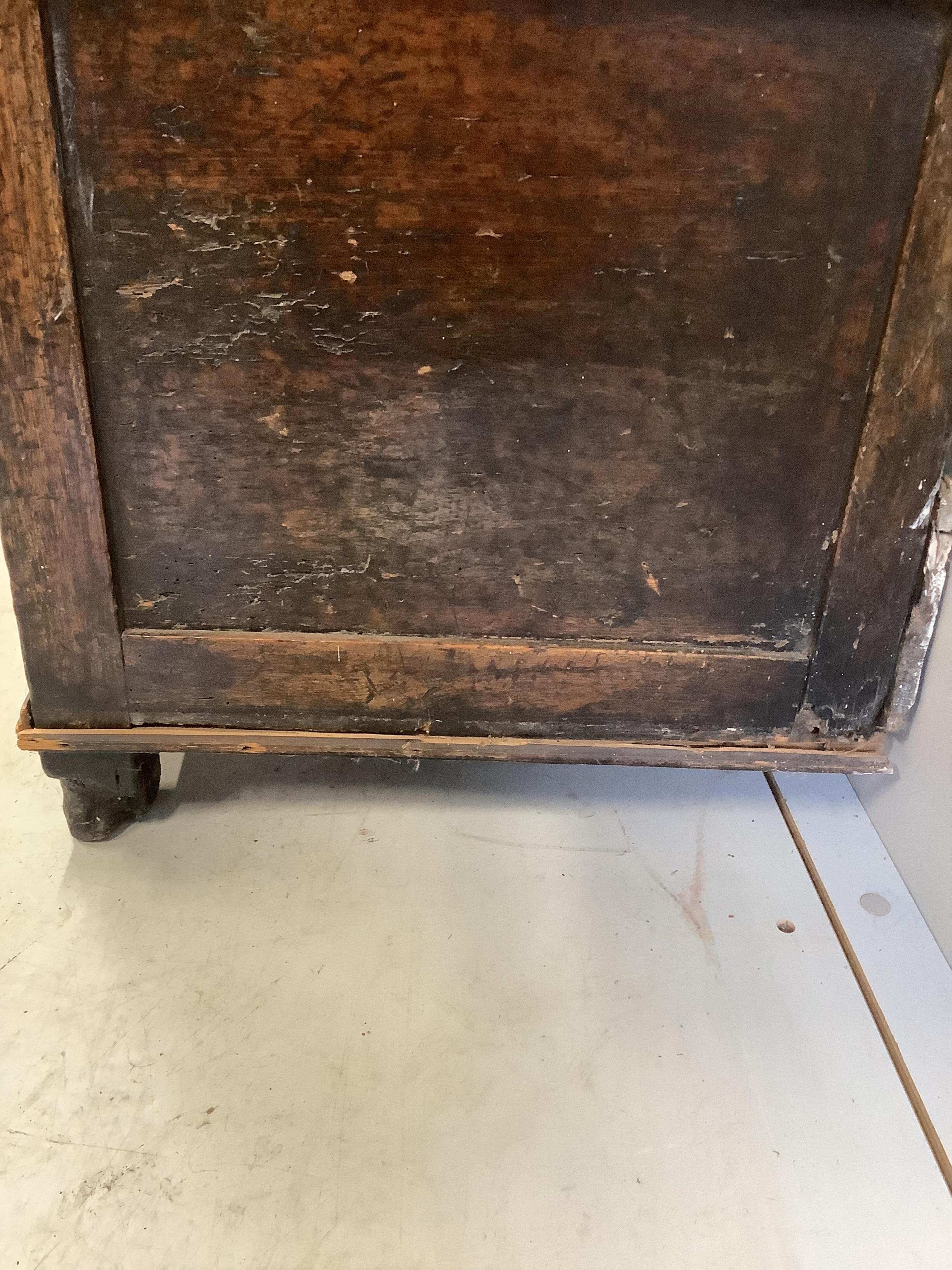 A George III oak dresser with boarded rack, width 168cm, depth 46cm, height 204cm. Condition - poor, lacks back legs